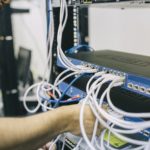 Picture of Managed IT Services technician working on server rack